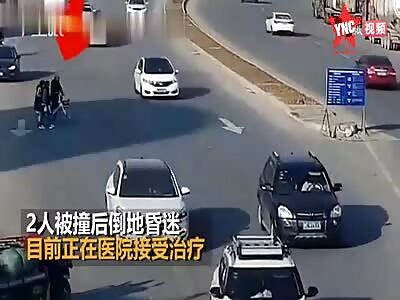 China: 2 people hit on a busy road.