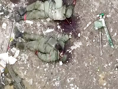 Many dead Russian soldiers after being hit by a 120 mm mortar