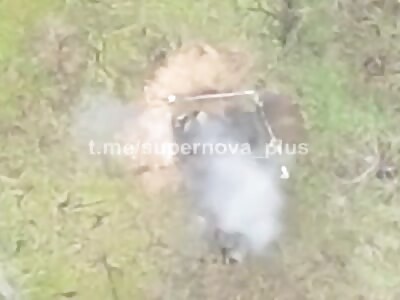 Drone drop on top of two Russian soldiers