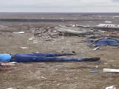 Dead Russians around the downed helicopter