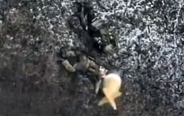 RU soldier gets hit in the lower back with a grenade