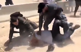 Israeli officers beating on civilians