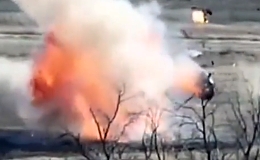 One Russian T-72B hits a mine and another cooks off while rolling