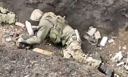 A compilation of drone dropping munitions on Russian trenches
