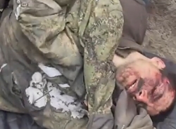 Ukrainian special forces help a Russian marine 