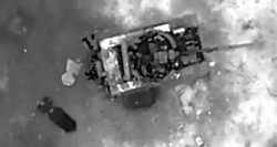 UA drone drops a munition on RU soldiers hiding by a tank
