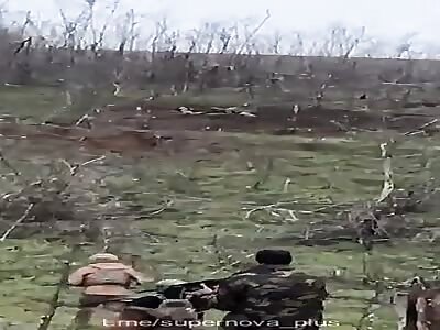UA soldier shows enemy bodies around his position