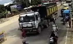 A woman is crushed by a truck
