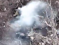 UA drone drops some type of smoke projectile in RU dugout