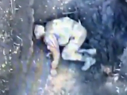 A grenade hits a Russian soldier in a trench