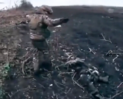 Ukrainian soldier passing by multiple RU bodies 