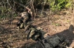 UA sniper and other troops working on the outskirts of Bakhmut