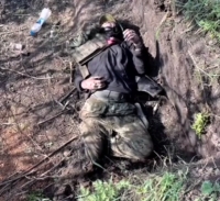 UA fighters show a destroyed Russian position near Bakhmut