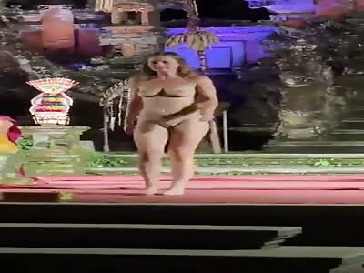 Naked woman invades dance show