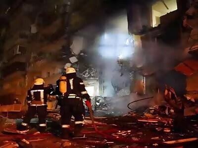 Civilian Building Damaged And Burning in Kiev