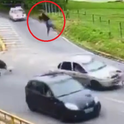 Woman Biker Sent Flying At Intersection