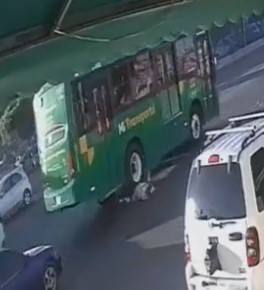poor woman crushed by moving bus