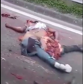 woman flipped a pizza on the road