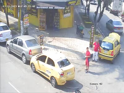 Idiot on motorcycle crashes into taxi