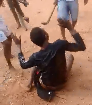 Scared Thief  is Dragged and Beaten by Angry Villagers