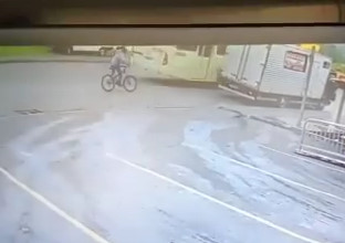 Cyclist CRASHES Into the Back of a Truck and  Instantly Dies