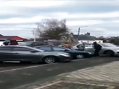 Russian army drive over family car.