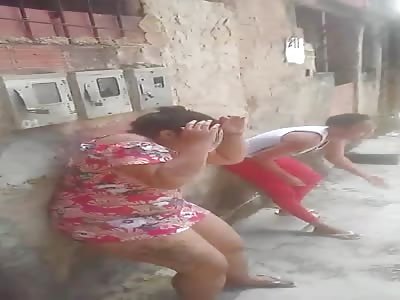CRYING WOMEN BEATEN FOR STEALING (different angle).