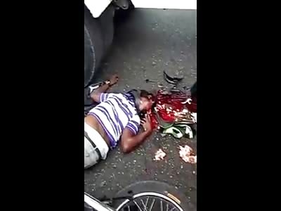 Motorcyclists head Popped on the Street 