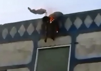 Electrocuted Man on Rooftop is Still Smoking and Burning 