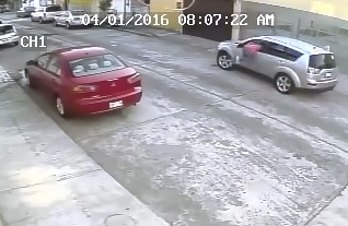Woman in Pink Shirt is Car Jacked then Run Over by Her Own Car 