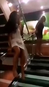 Blonde Girl in Miniskirt Falls from Stairs 