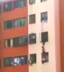 Thug trying to Flee from police falls from the 4th Floor 
