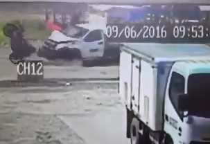 Motorcyclist Ends Up almost Over a Truck after Collision 
