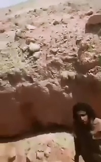 Revenge:  ISIS Member is Executed while Digging his Own Grave by Iraqi Soldier 