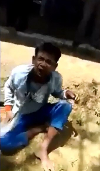 Sobbing Kid is Beaten with Sticks..Smashed with Stones until he is left Unconscious 