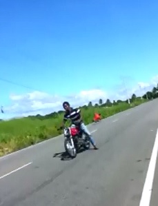 Man Tumbles on the Concrete after Falling off Motorcycle during Race 