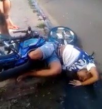 Man having Convulsions in a Puddle of mud after Motorcycle Accident 
