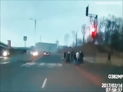 Female Driver plows into Crowd of Pedestrians..All Caught on Dashcam 