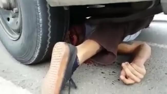 Skateboarder ends killed twisted up under a car