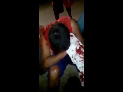 Man Bleeding Profusely after Machete Attack 