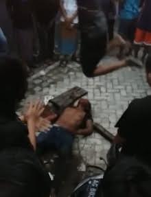 Thief stomped, brutally beaten with sticks and helmets while crowd laughs