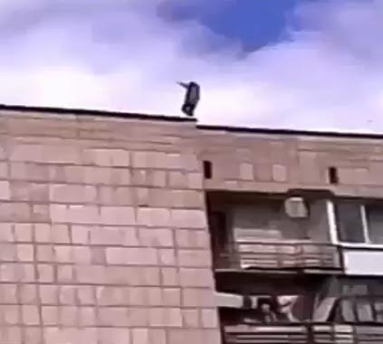 Girl commits suicide falling from building, Hits Everything on the Way Down  - 2 camera angles