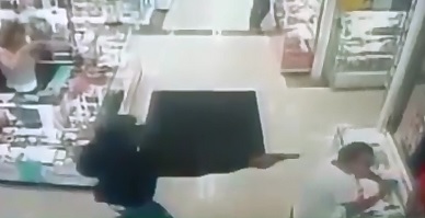 Man at Pharmacy Counter gets Bullet to the Head Point Blank 