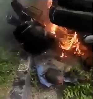 Doomed Motorcyclist Burns Alive as He's Trapped under Truck 