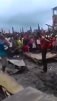 Man Slashes his Own Brother to Death in Front of Crowd with a Machete 