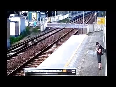 Man Running across Train Tracks is killed Instantly in Slow Motion 
