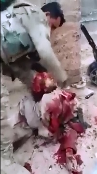 Iraqi Soldier Gruesomely takes the Head off of an ISIS Member 