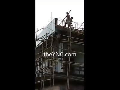 Scaffolding Worker is Fried in front of many many people.  