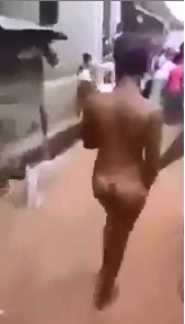 Shy Female Accused of Thievery is Stripped Totally Naked and Paraded through Public 