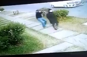 Woman on a Stroll takes Headshot to the Back of the Head 
